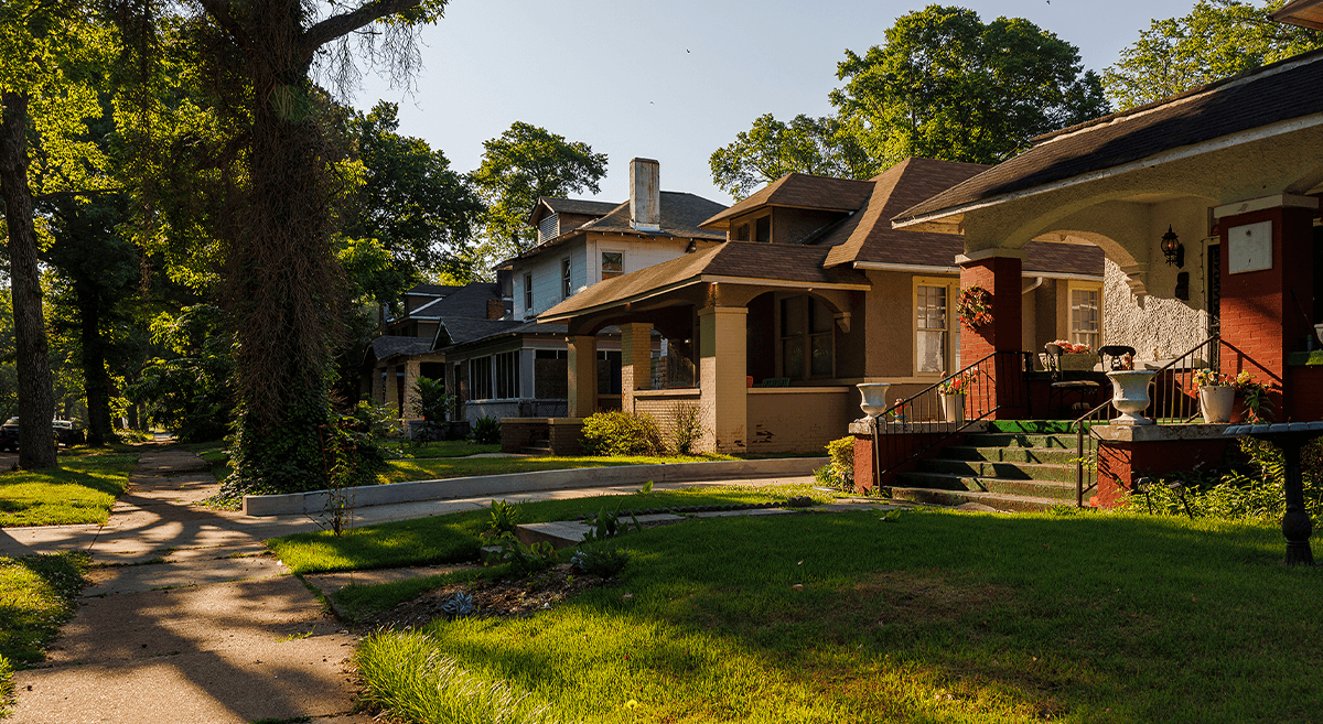 Outdoor shot of houses in a neighborhood on a sunny day.