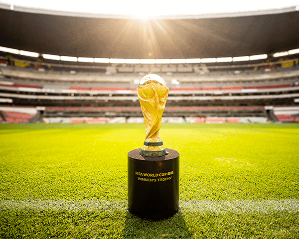 FIFA trophy on a soccer field, links to Marriott.com.