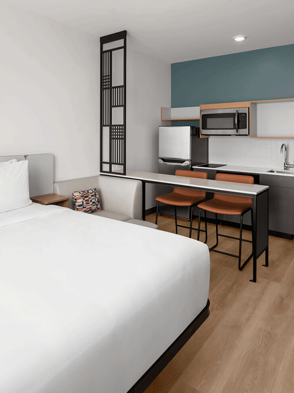 Studio Res room with a small kitchenette.