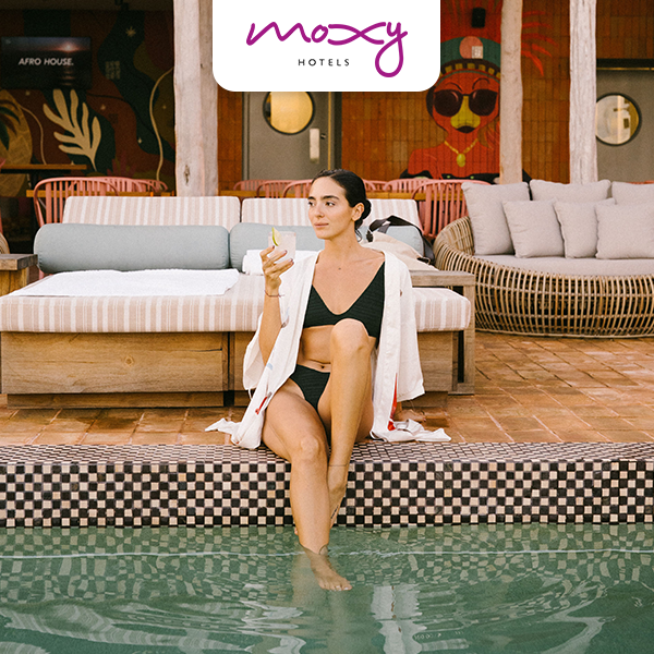 Lifestyle image of a women at the Moxy Tulum pool.