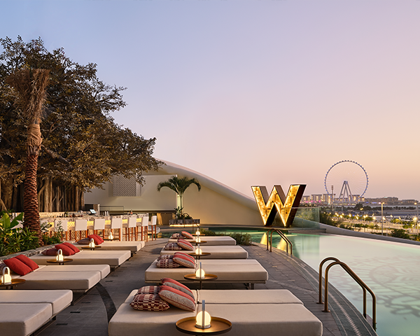 Exterior of modern hotel rooftop with prominent Marriott hotel logo.