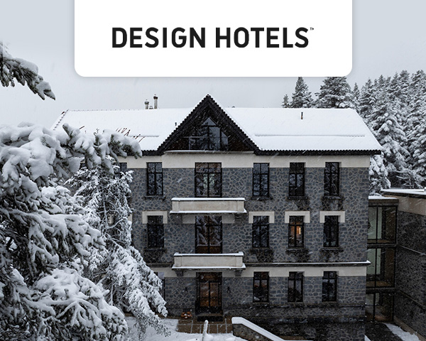 Outdoor view of a Design Hotels property in a winter scene.