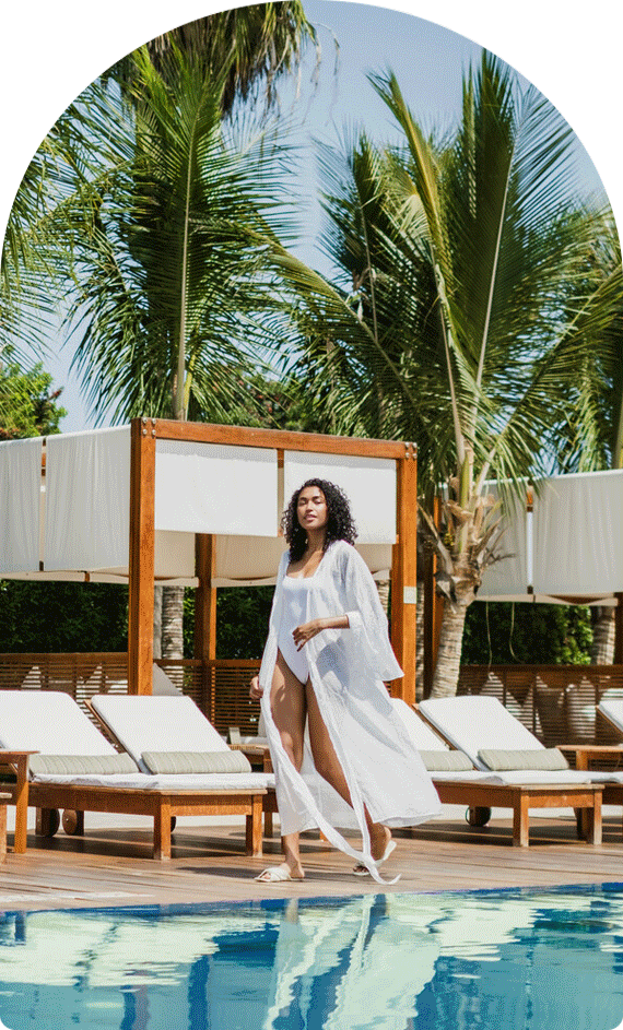 Animated GIF of a woman walking poolside and the hotel view of Hotel Paracas, a Luxury Collection Resort.