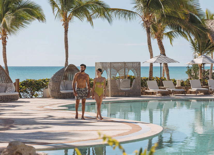 Two people enjoying a stay at an all-inclusive resort.